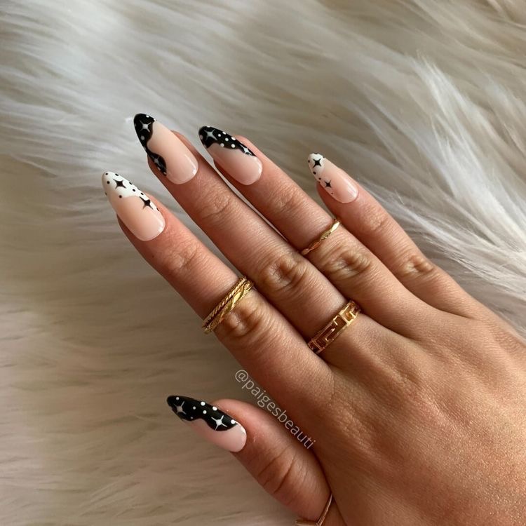 black and white polka dots nail art
